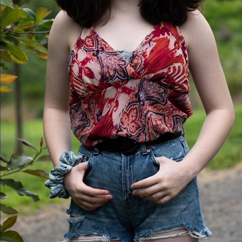 Red flowery blouse
